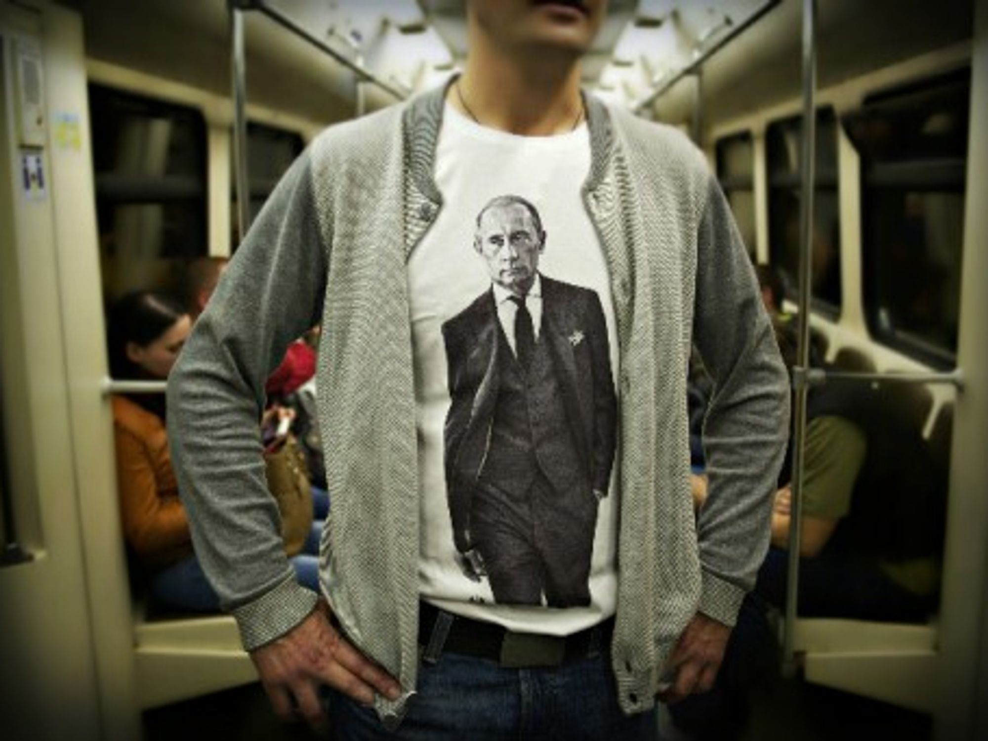 Man wearing a Putin T-shirt in Moscow's underground