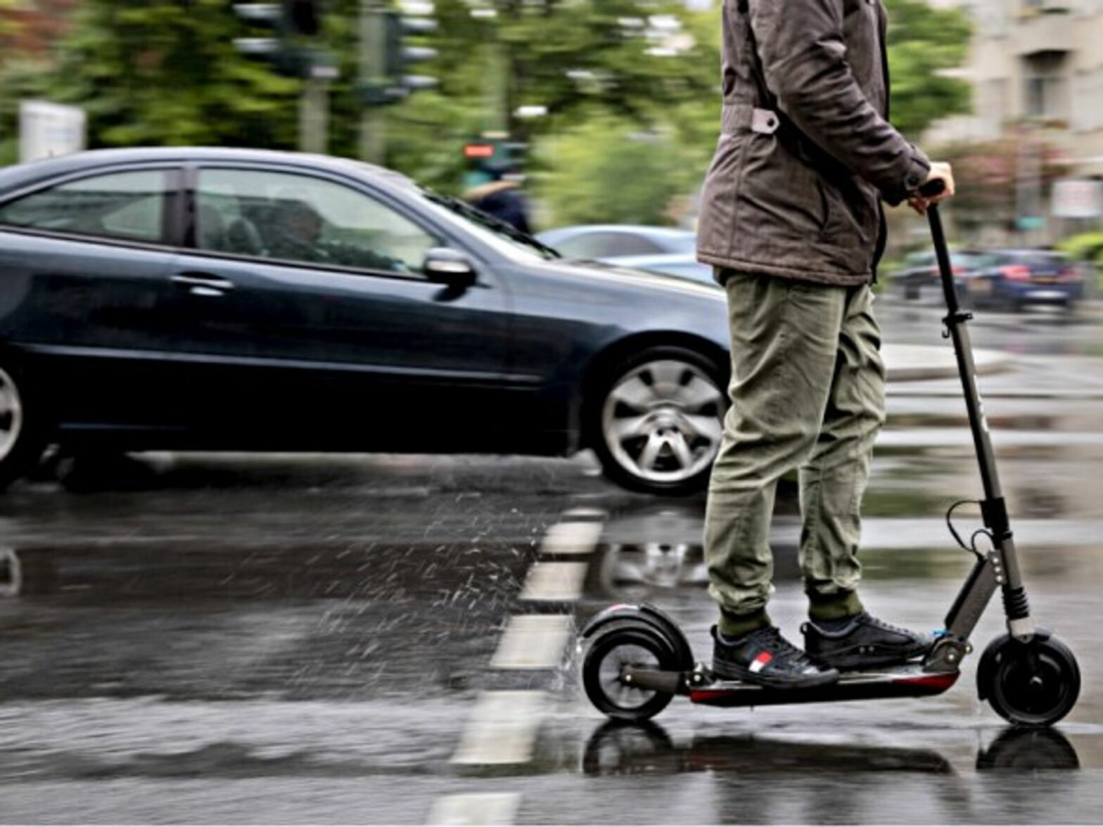 Marcel Hutfilz, managing director of Scooterhelden on the streets of Berlin.