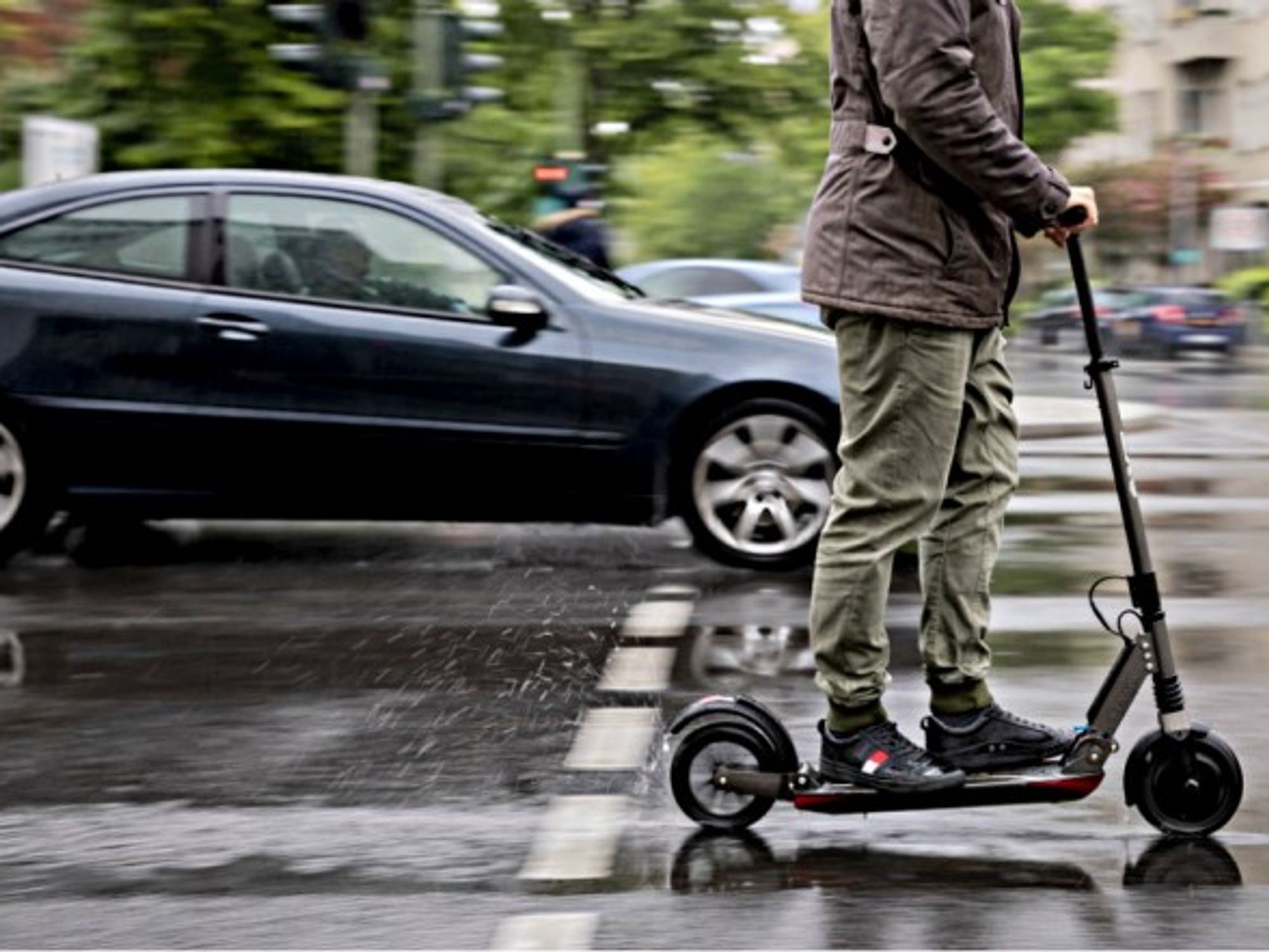 Marcel Hutfilz, managing director of Scooterhelden on the streets of Berlin.