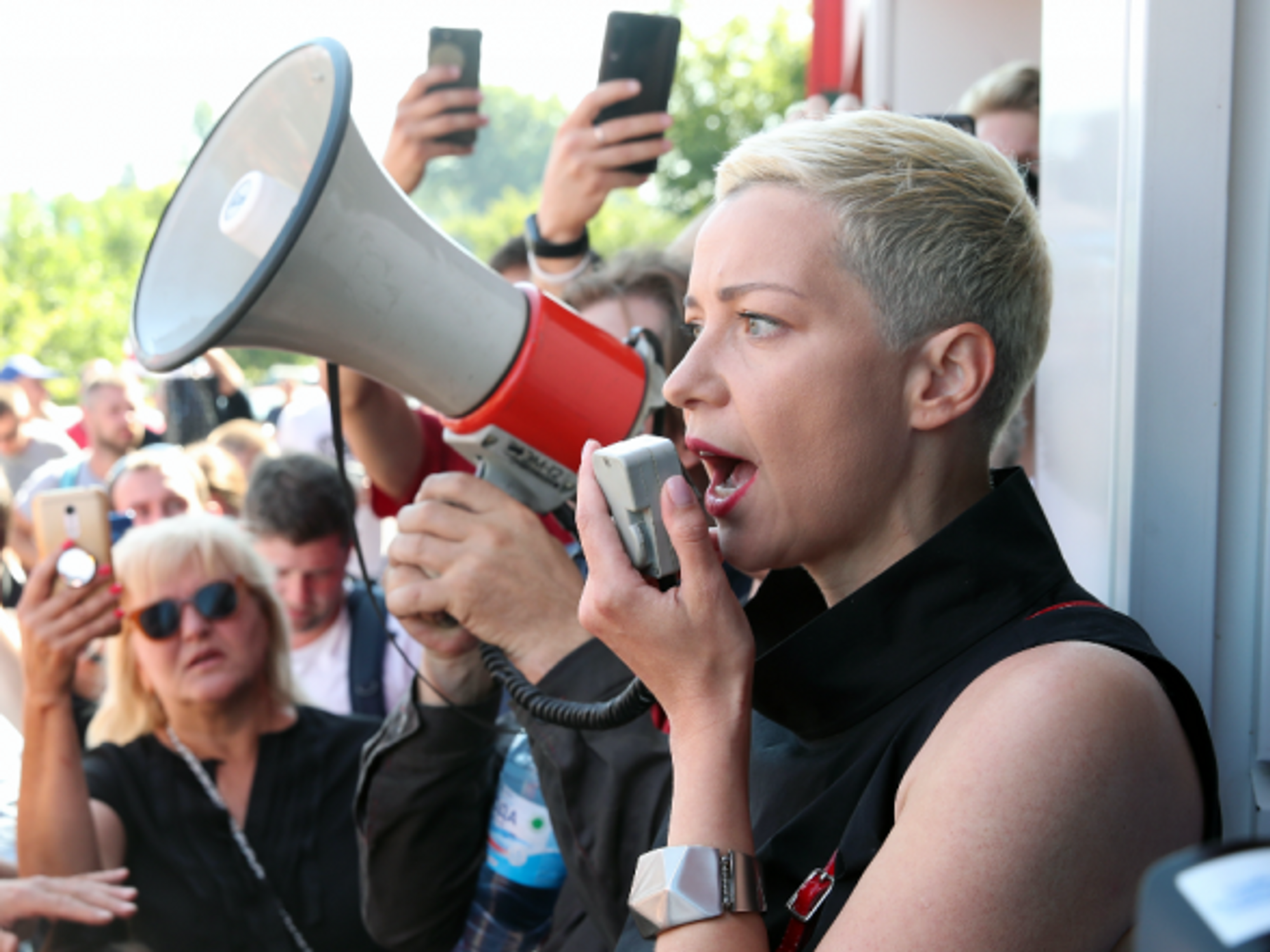 Maria Kolesnikova speaks into a megaphone during a rally in Minsk, August 17, 2020.