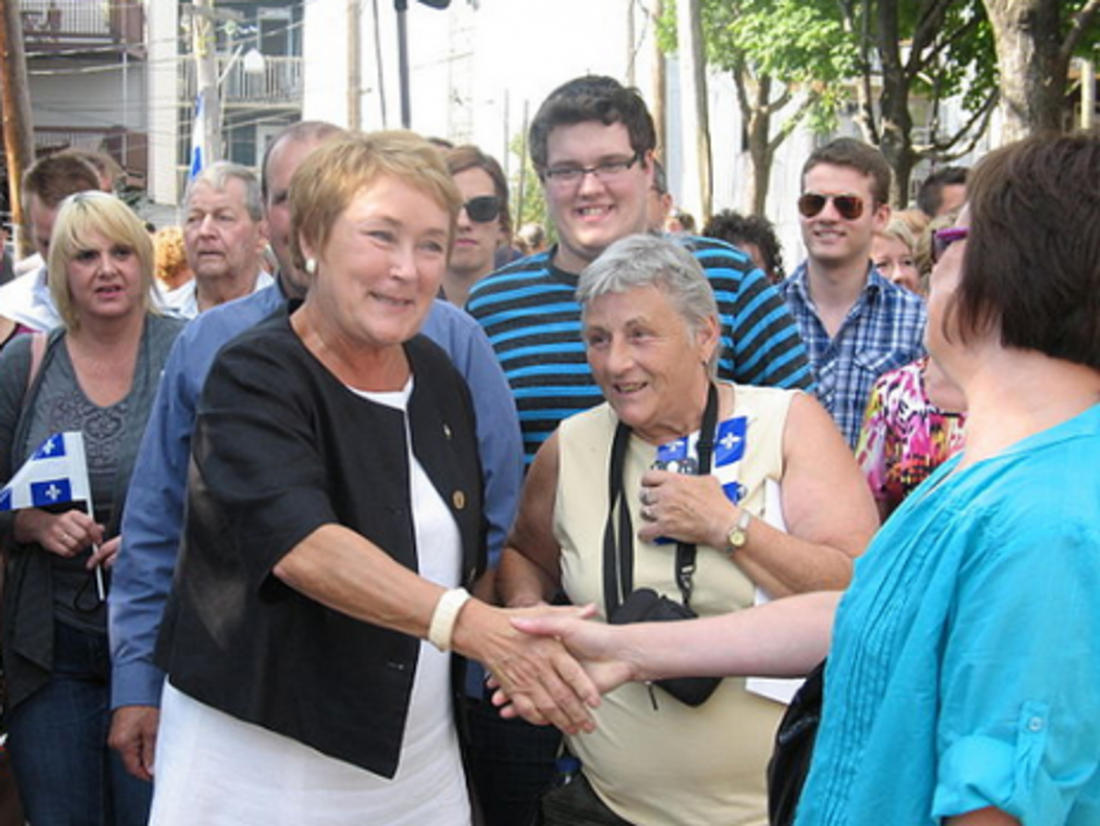 Marois meets her supporters