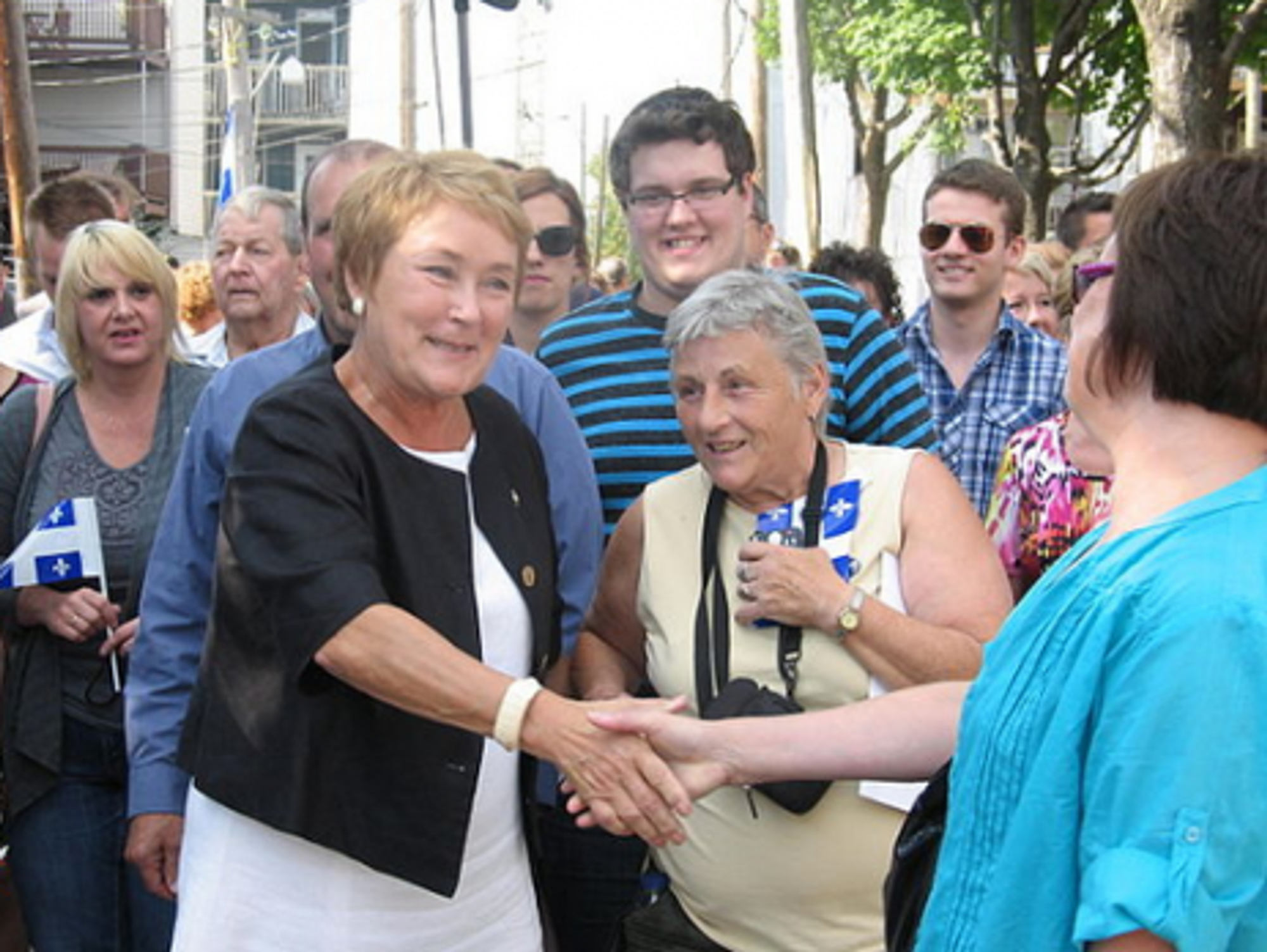 Marois meets her supporters