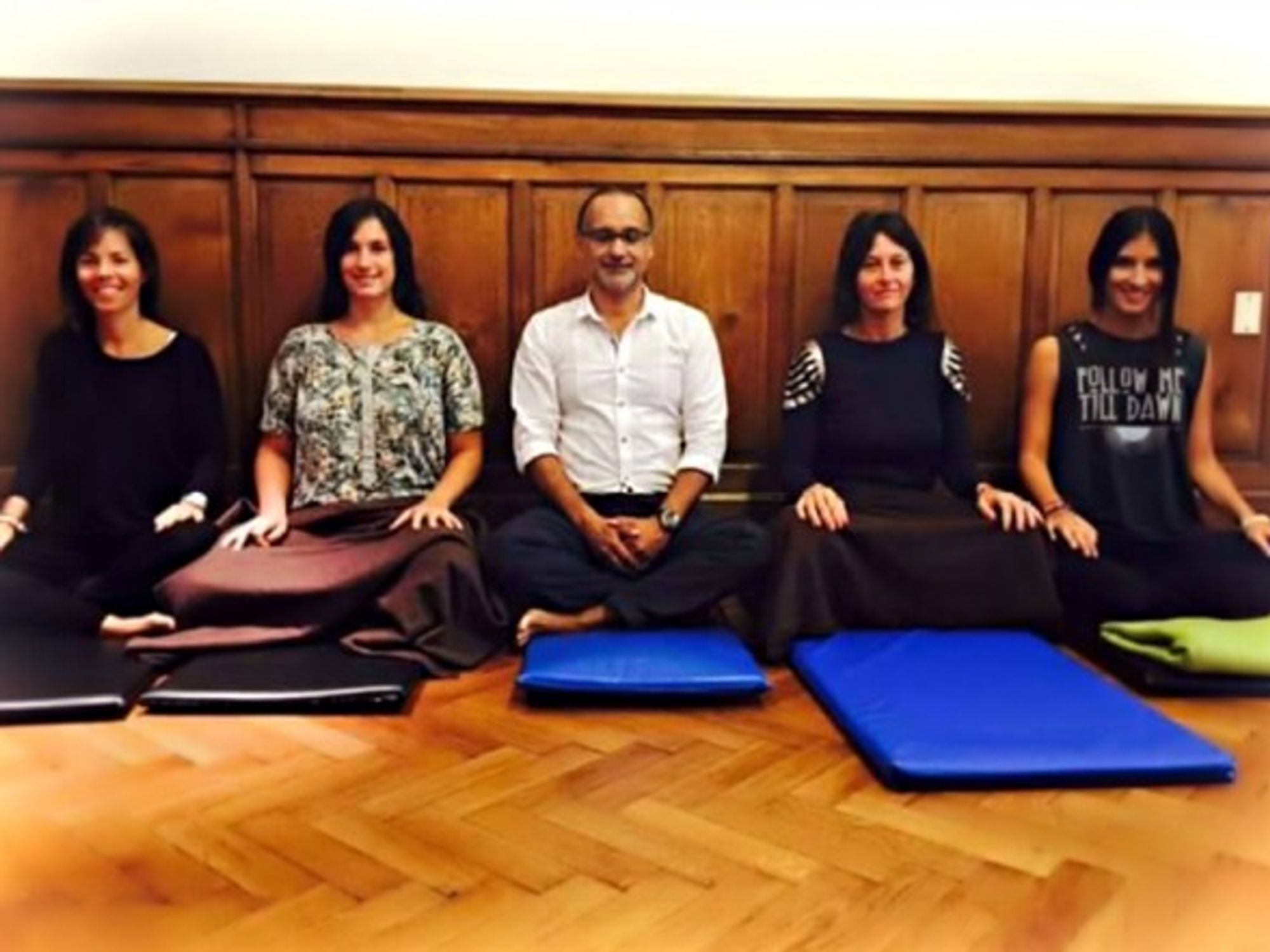 Martin Reynoso (center) meditating