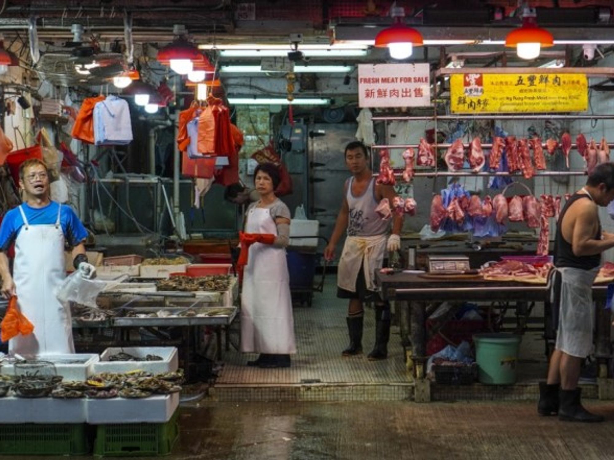 Meat and seafood stalls at the North Point Wet Market in Hong Kong.
