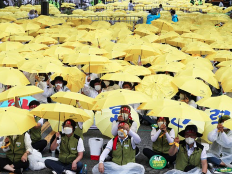 Medical workers rally in Sejong, South Korea, calling for an expansion of public medical services and measures to curb illegal medical treatment.