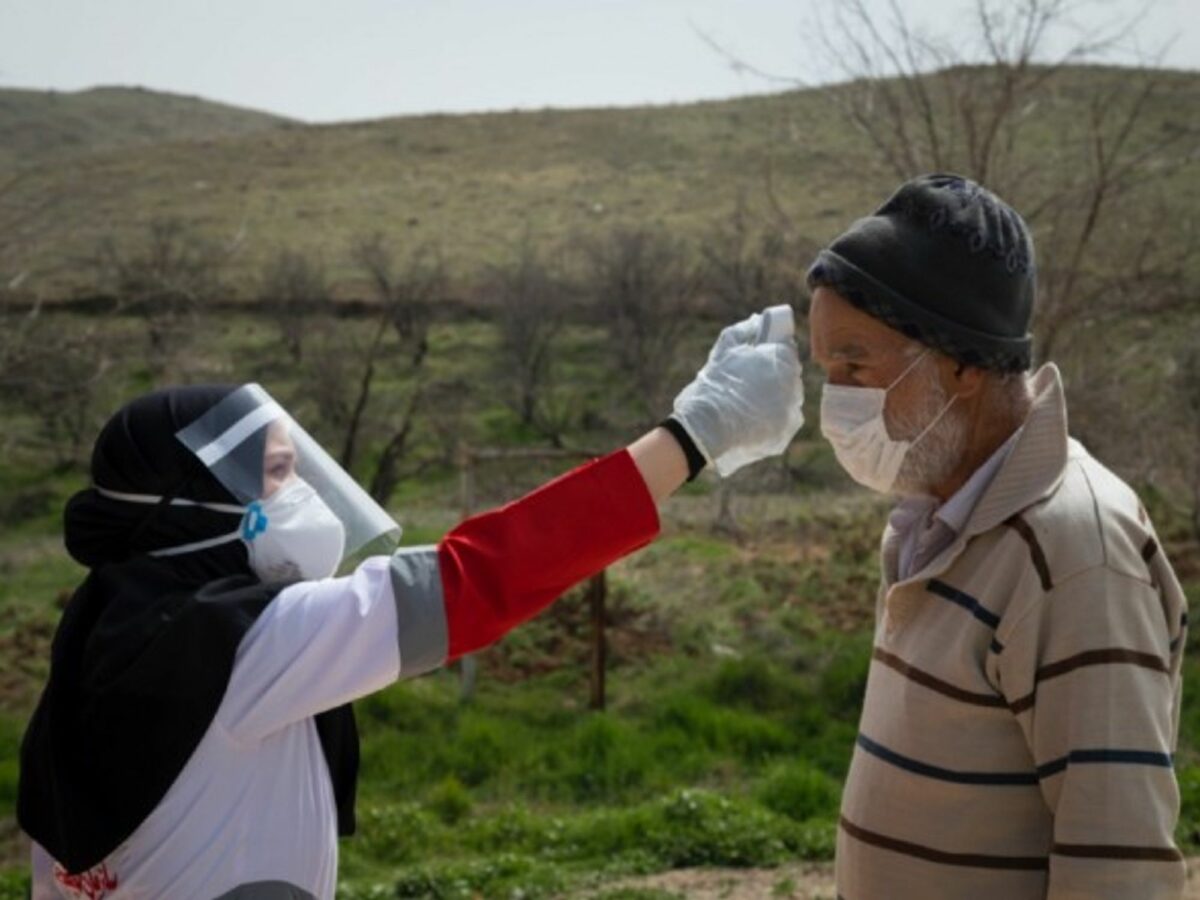 Members of the Iranian Red Crescent's Volunteers Organization in the Hameh Sin mountain village in Eastern Tehran, Iran, sanitizing and screening villagers who may be infected by coronavirus.