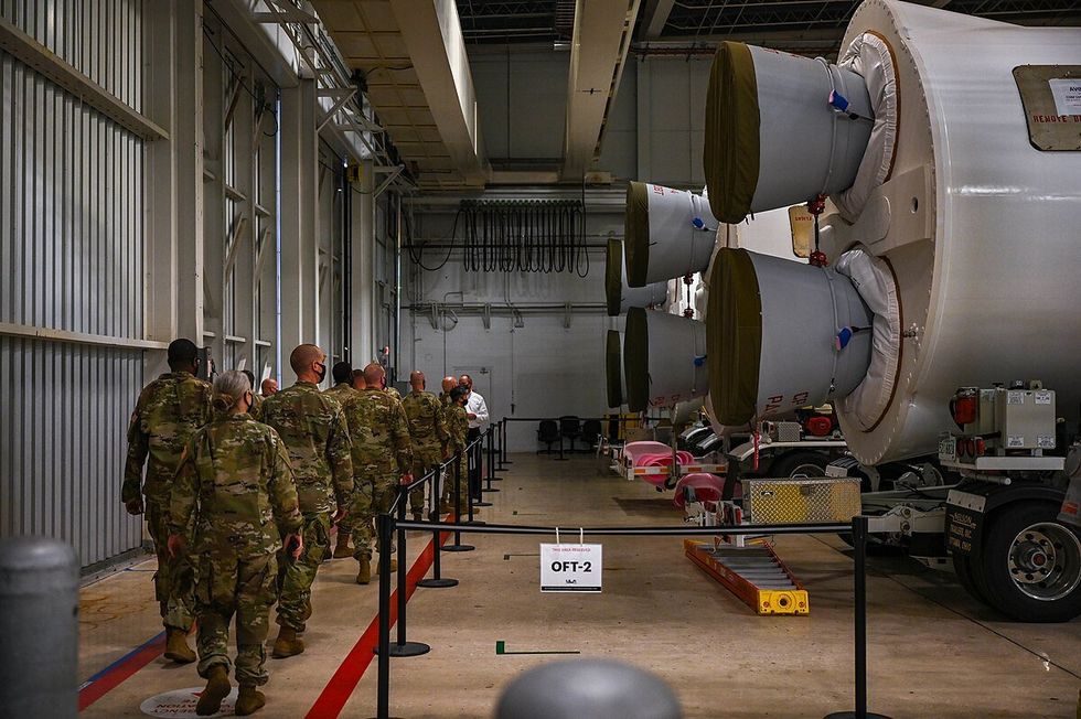Members of the U.S. Space Command tour a United Launch Alliance facility at Cape Canaveral Space Force Station.