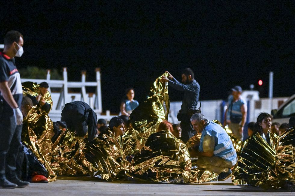 Migrants arrive in Roccella Jonica, Italy, on Sept. 29, 2024.
