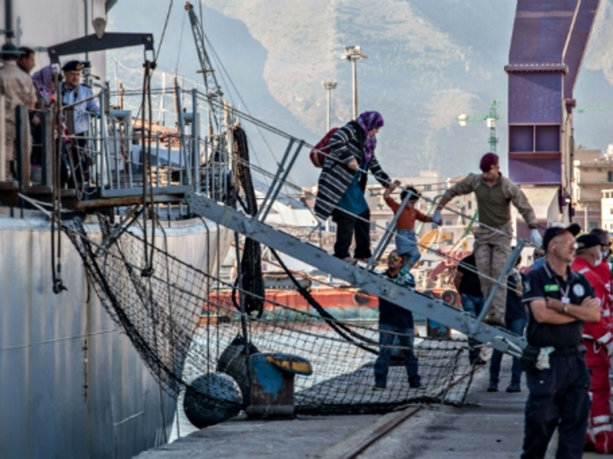 Migrants arriving in Palermo, Italy, after a rescue mission