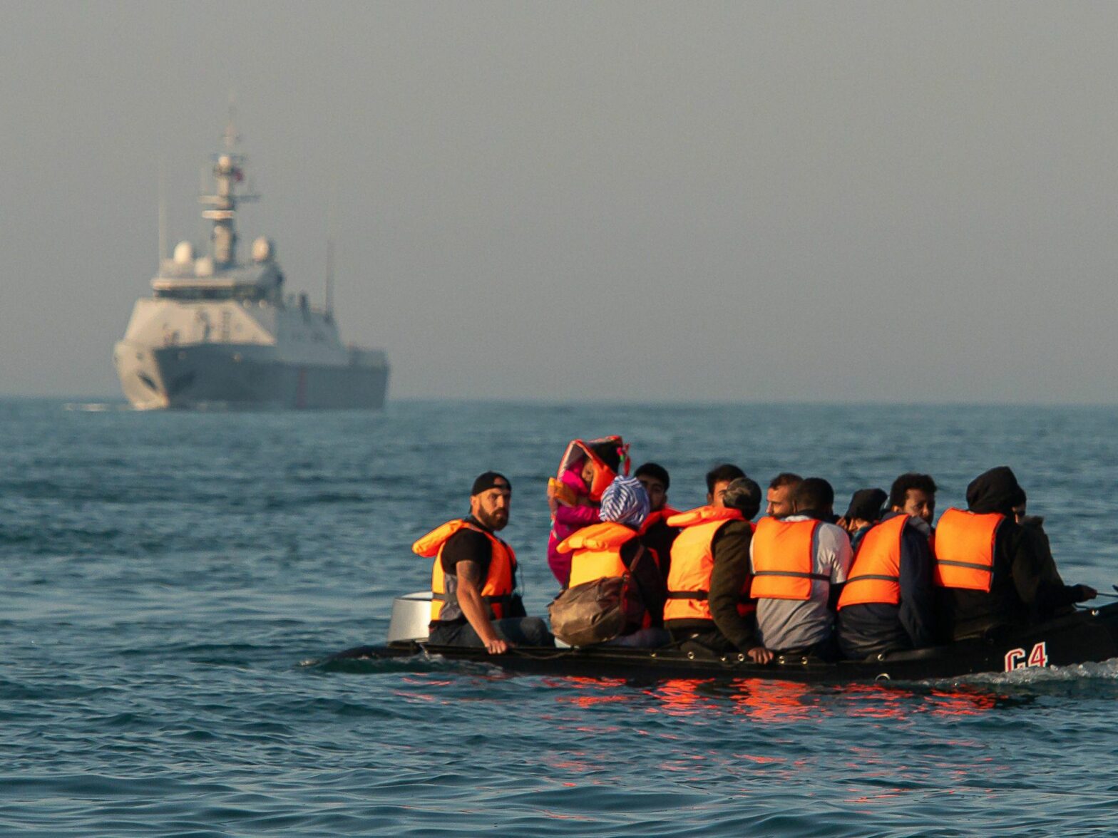 Migrants on a dinghy on the English Channel