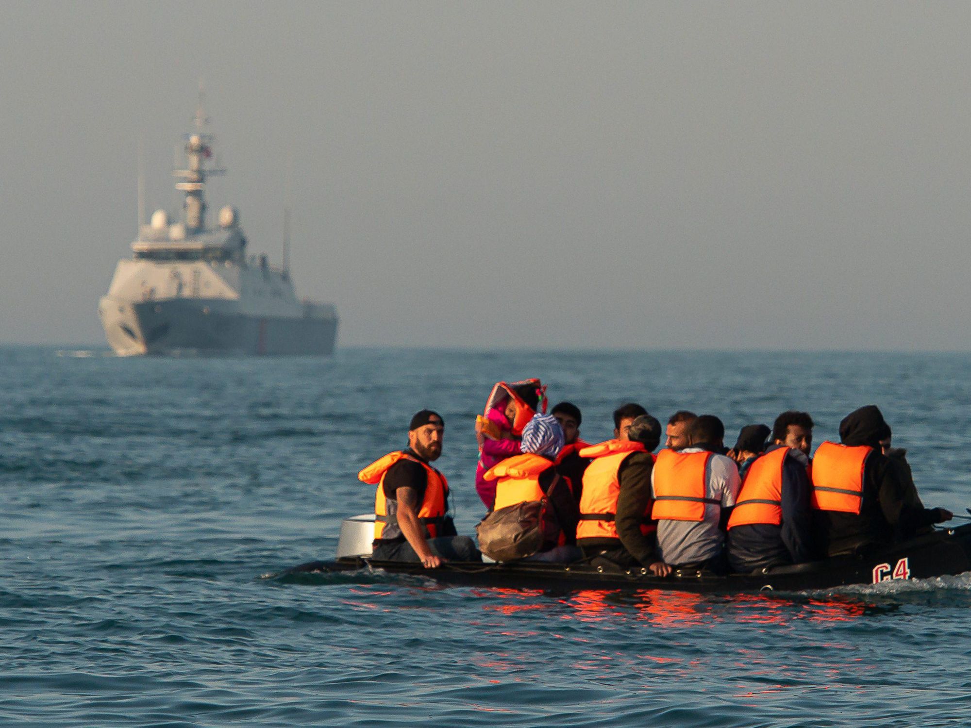 Migrants on a dinghy on the English Channel