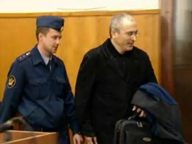 Mikhail Khodorkovsky being led into court during his second trial.