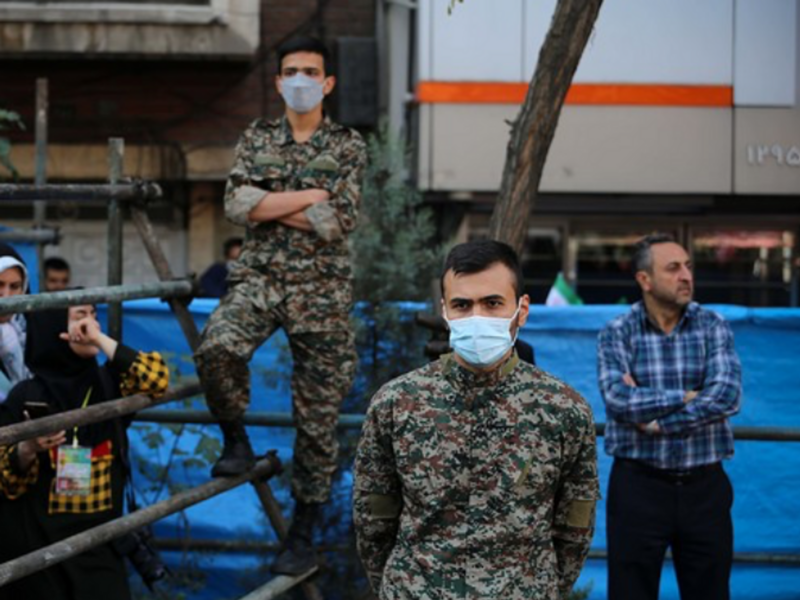military men masked standing