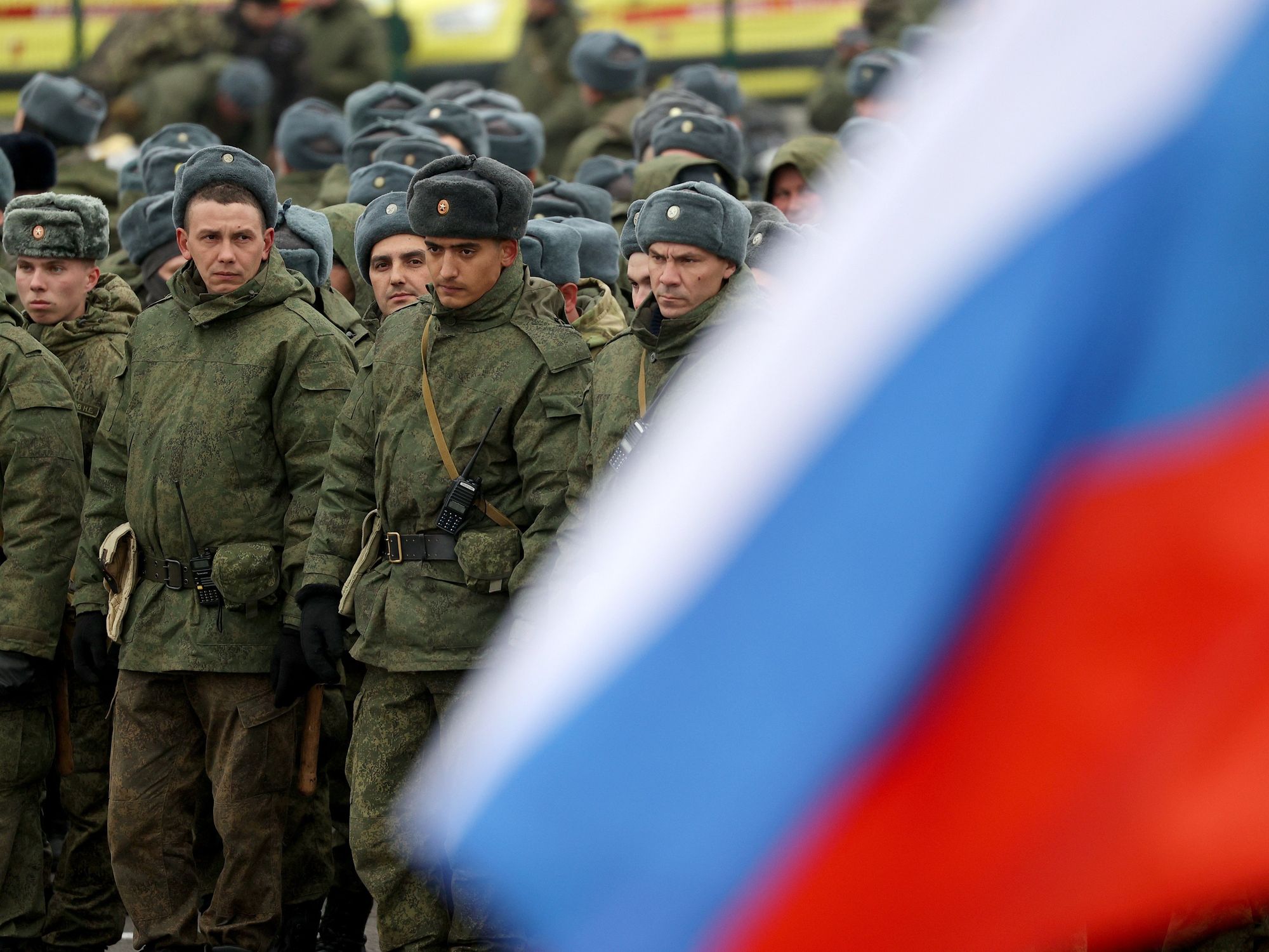 Mobilized Russian citizens line up at an assembly station at the Kazan Expo International Exhibition Center ahead of departing for the zone of Russia's special military operation.