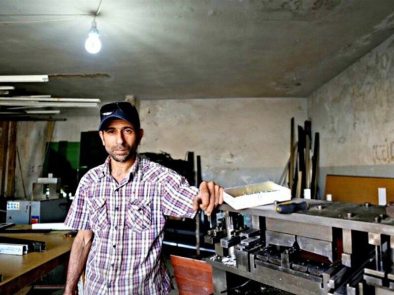 Mohammad Azaqeer of Syria, now lives in Lebanon working as an aluminum presser