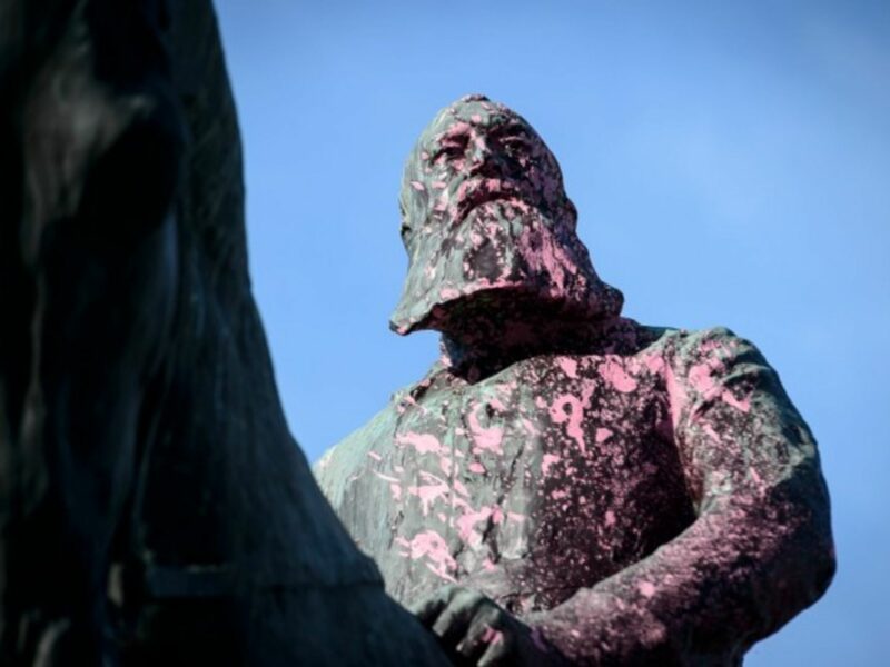 Monument of King Leopold II in Brussels paintbombed with pink paintin 2018.