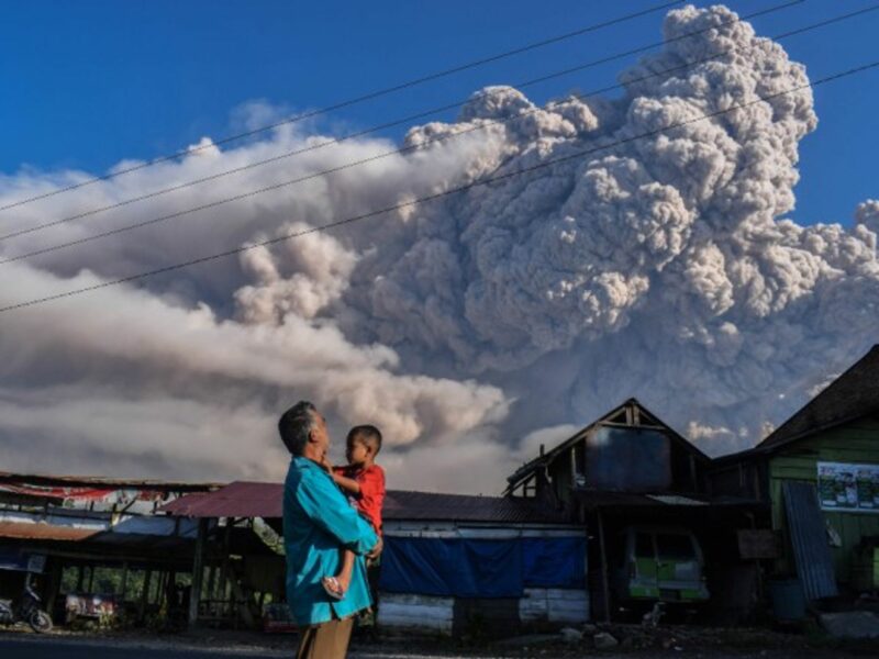 Mount Sinabung spews volcanic material during an eruption in Karo, Indonesia.