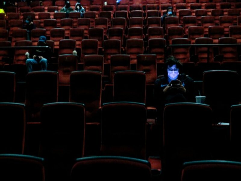 Moviegoers at the AMC Theater on the first day of reopening for theaters which had been closed due to the COVID-19 pandemic in Burbank, California