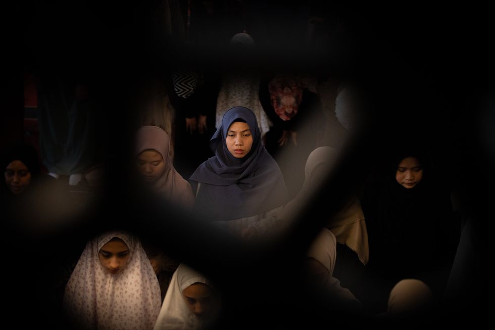 Muslim women perform Eid prayers at Kocatepe Mosque in Ankara.