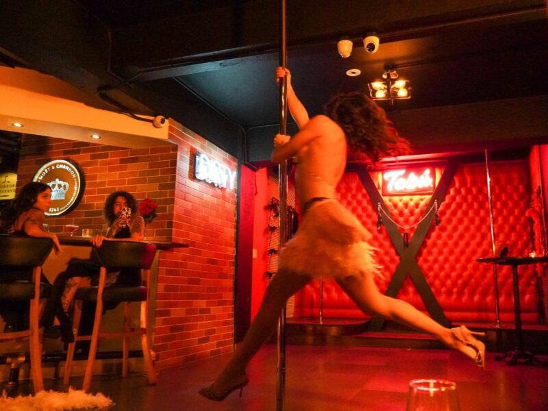 Naomi Curbelo dances in a strip club.