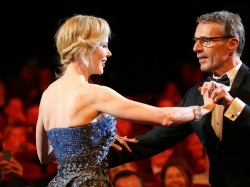 Nicole Kidman and Lambert Wilson dance briefly during the opening ceremony of the 67th Cannes International Film Festival