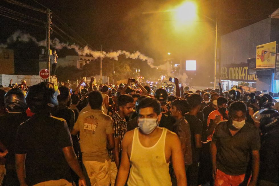 Night photo of protesters marching in Colombo, Sri Lanka, on March 31​