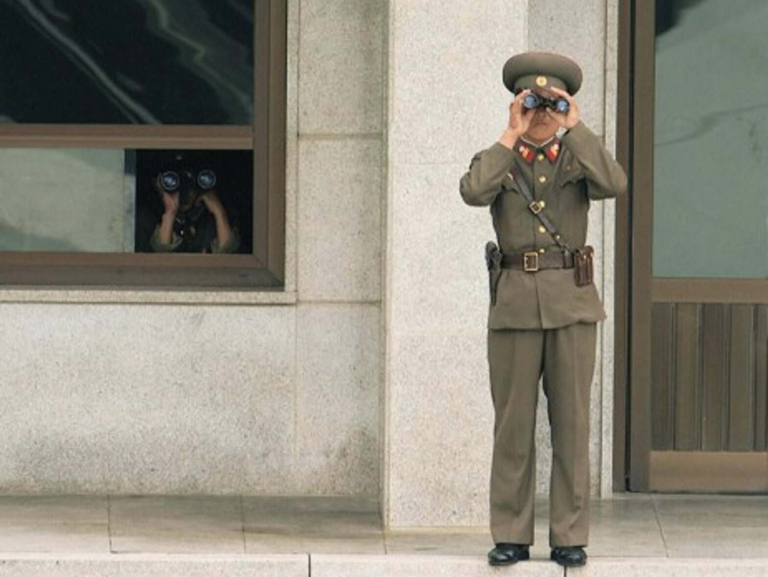 North Korean guard looking south