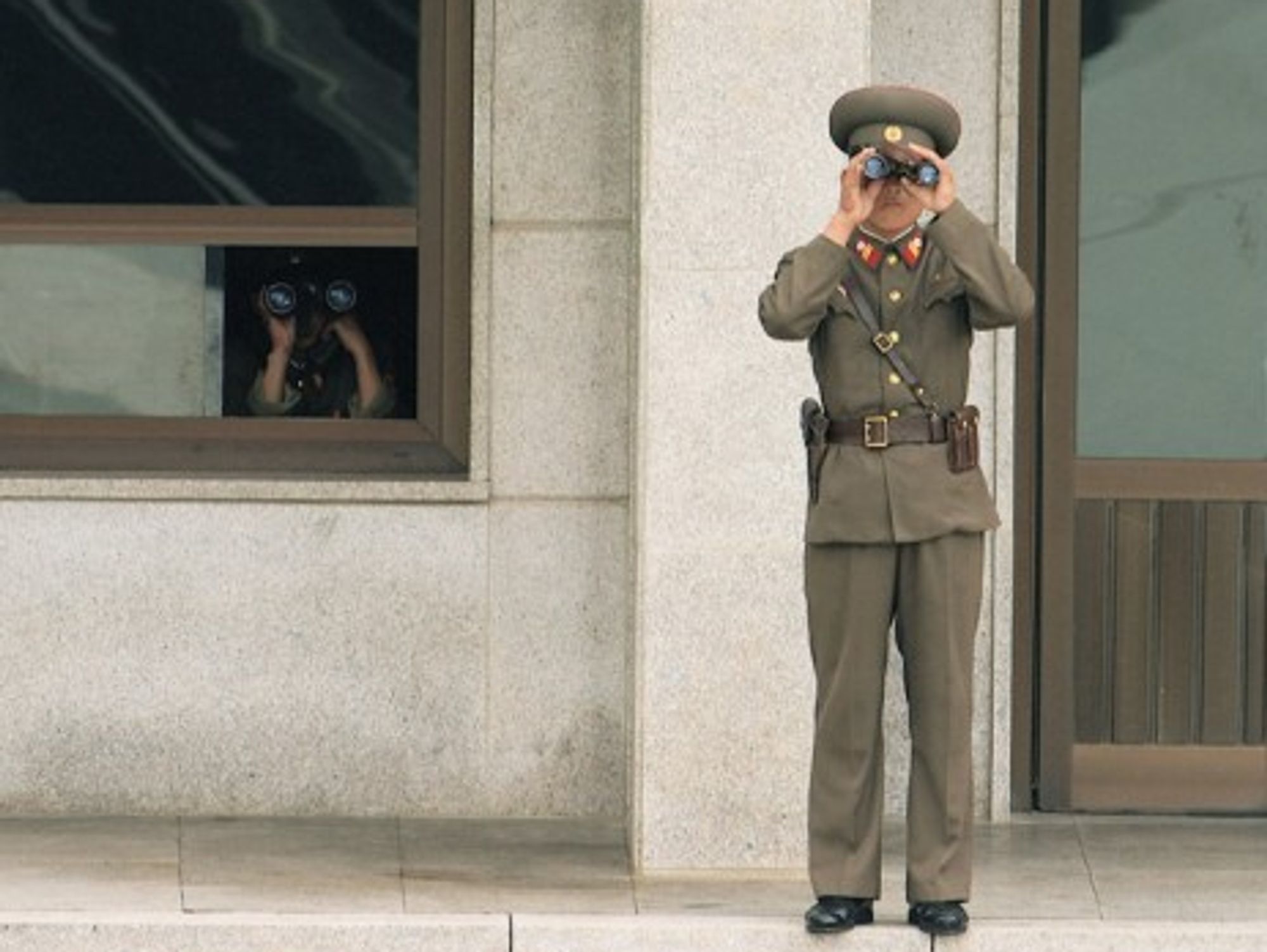 North Korean guard looking south