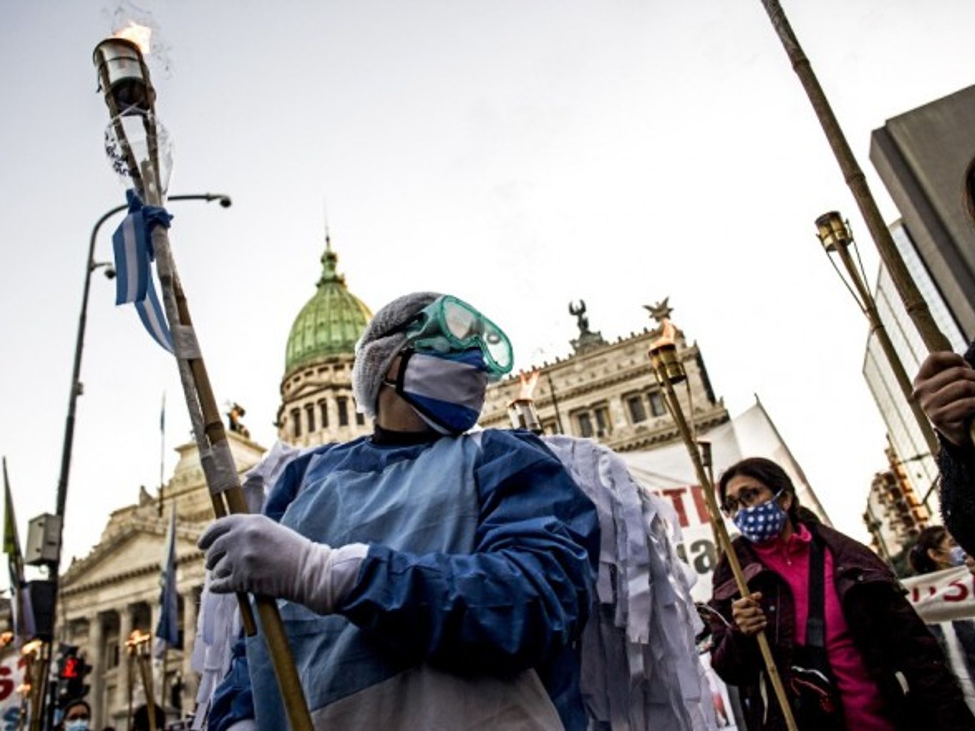 Nurses protesting in front of the Argentinian Congress during yesterday’s International Nurses’ Day. The pandemic continues to hit Argentina hard, with 24,475 new cases and 496 deaths reported on Tuesday.