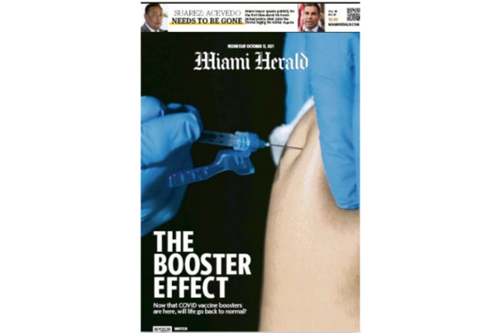 Oct. 13 front page of U.S. daily Miami Herald reading "The Booster Effect" featuring a photo of a person getting a COVID booster jab.