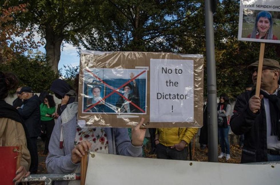 October 2022. People are protesting in front of Iran's Embassy in Berlin. They demand the liberation of political prisoners detained in Iran.