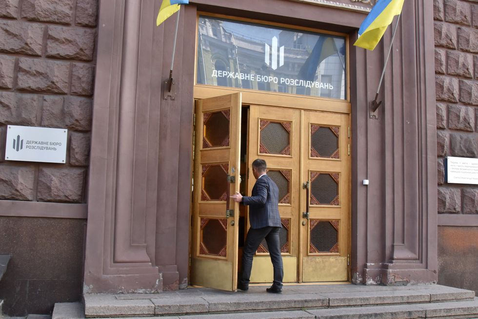 Oleksandr Novikov arriving at the State Bureau of Investigation (SBI) for interrogation.