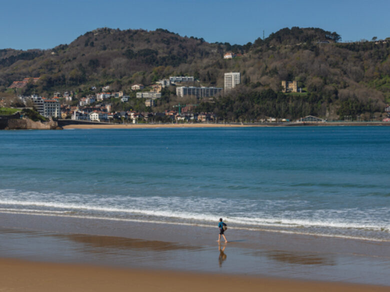 On the beach of La Concha, in San Sebastian, Spain