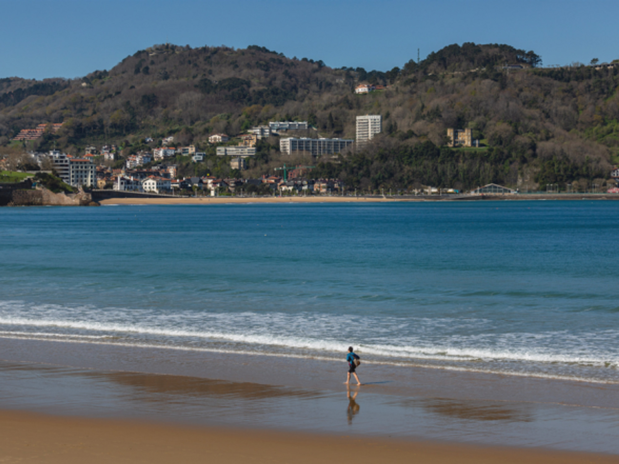 On the beach of La Concha, in San Sebastian, Spain