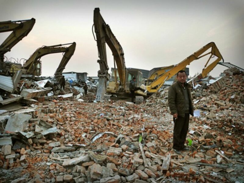 On the debris of last month's fire that killed 19 in Xinjian, Daxing.