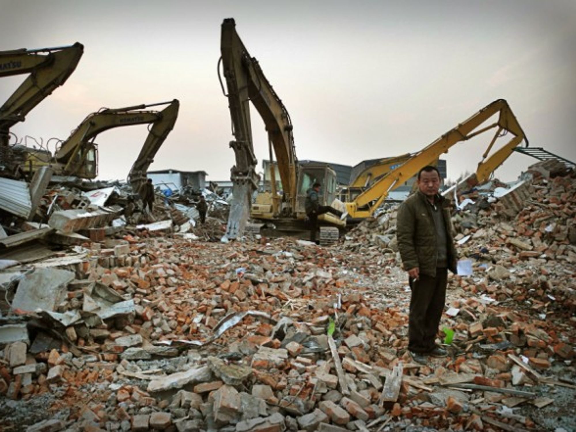 On the debris of last month's fire that killed 19 in Xinjian, Daxing.