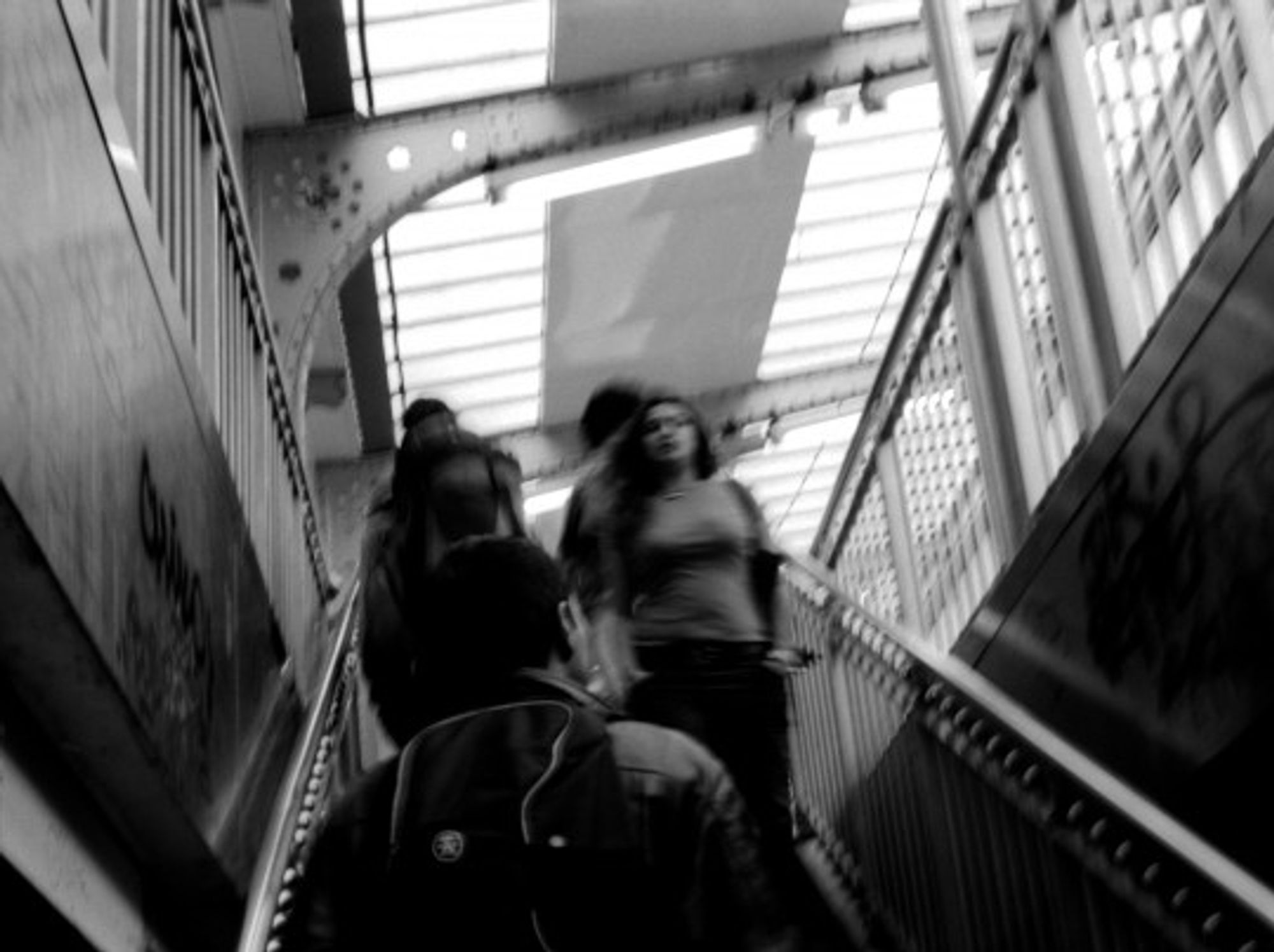 On the narrow stairs in the Paris metro.