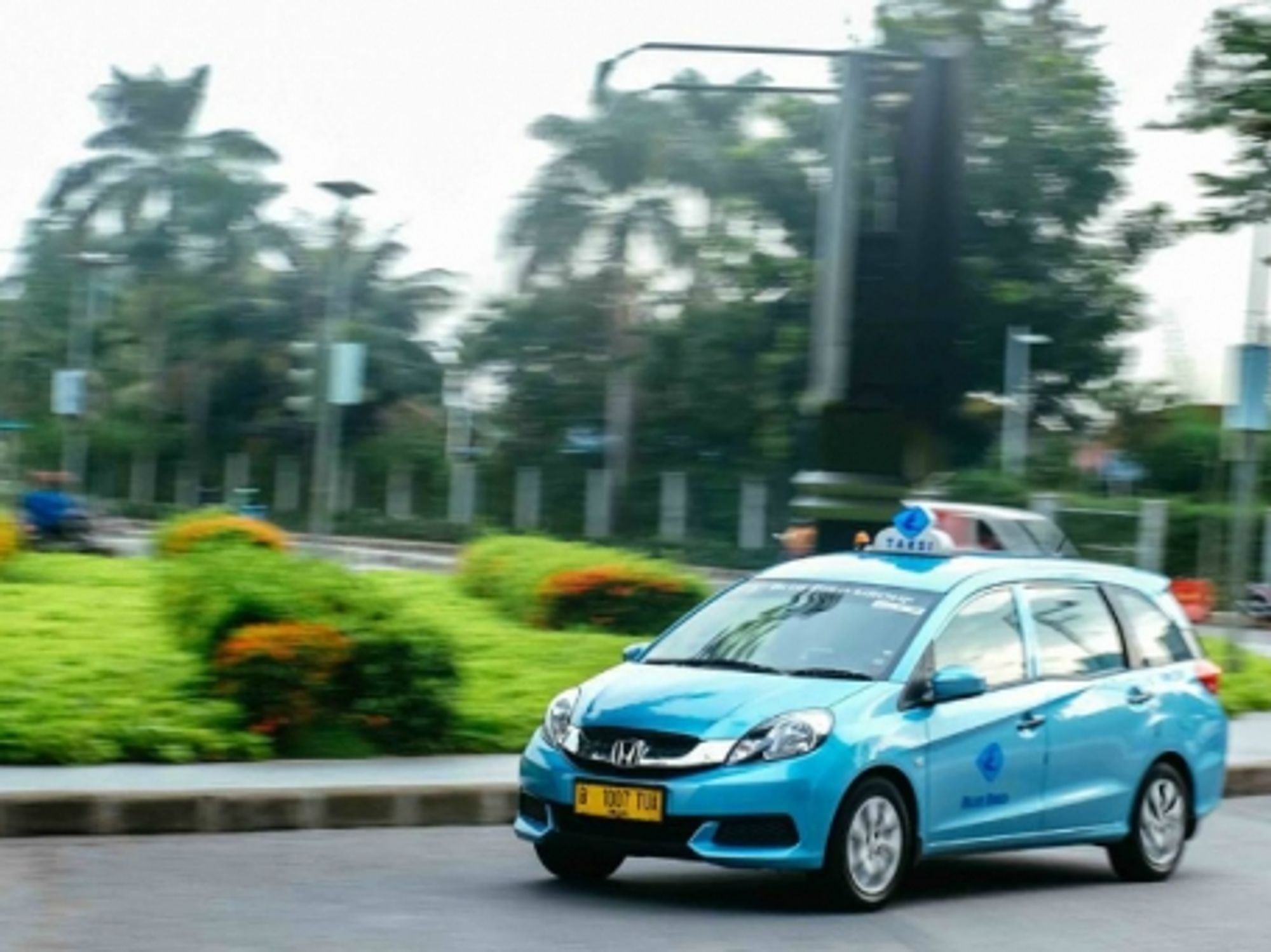 One of Indonesia's thousands of Blue Bird taxis
