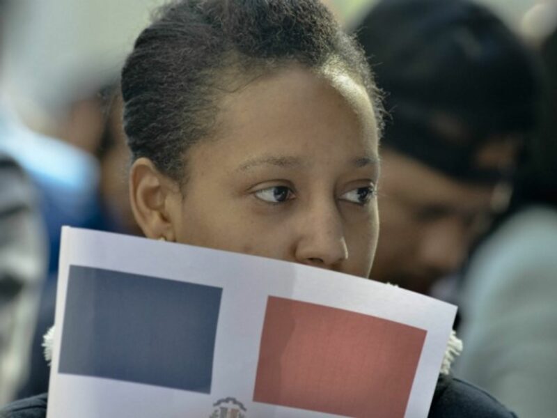 One of the many migrants taking to the streets to protest policy on immigration
