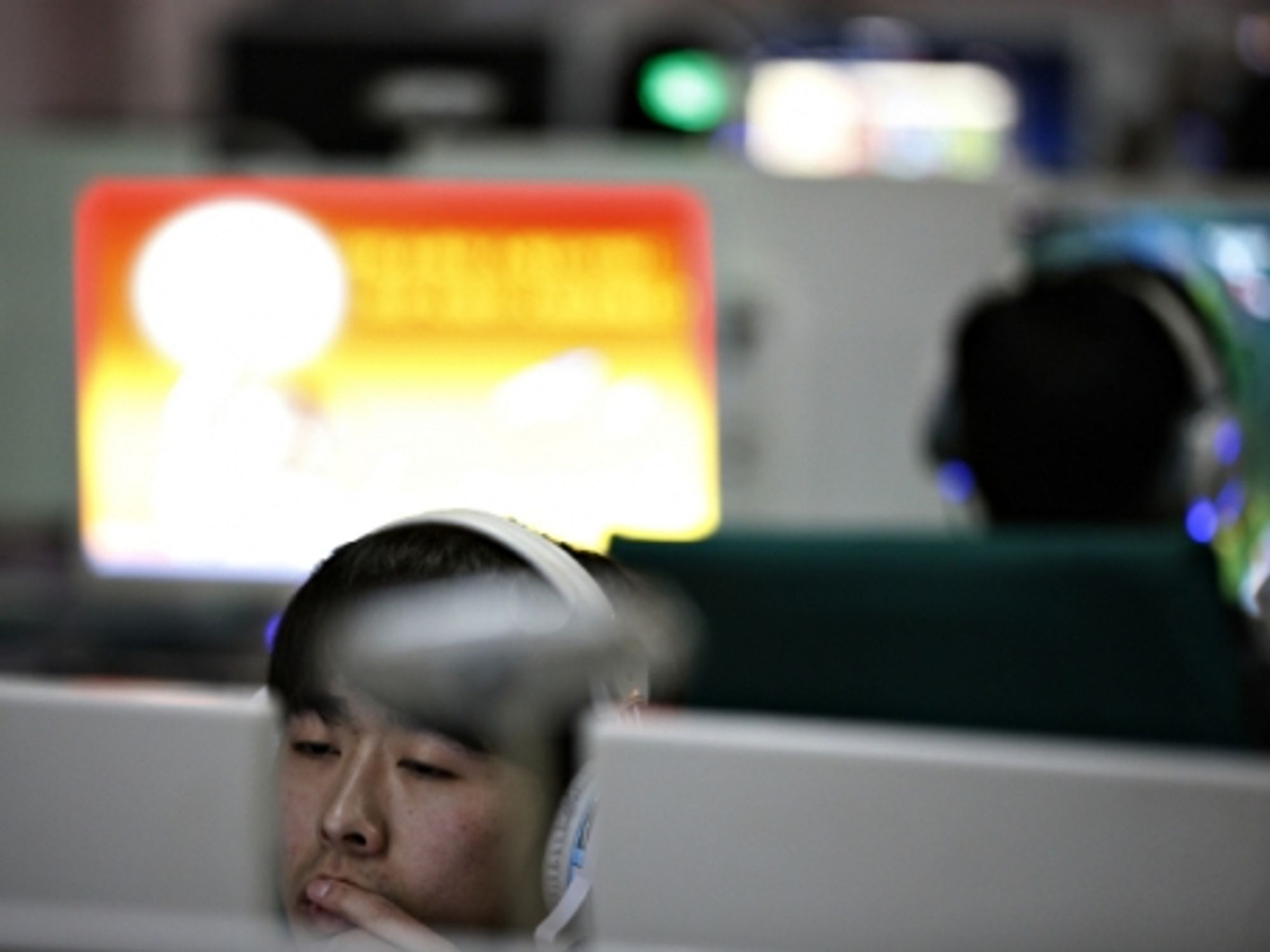 Online at an Internet cafe in Huaibei, China