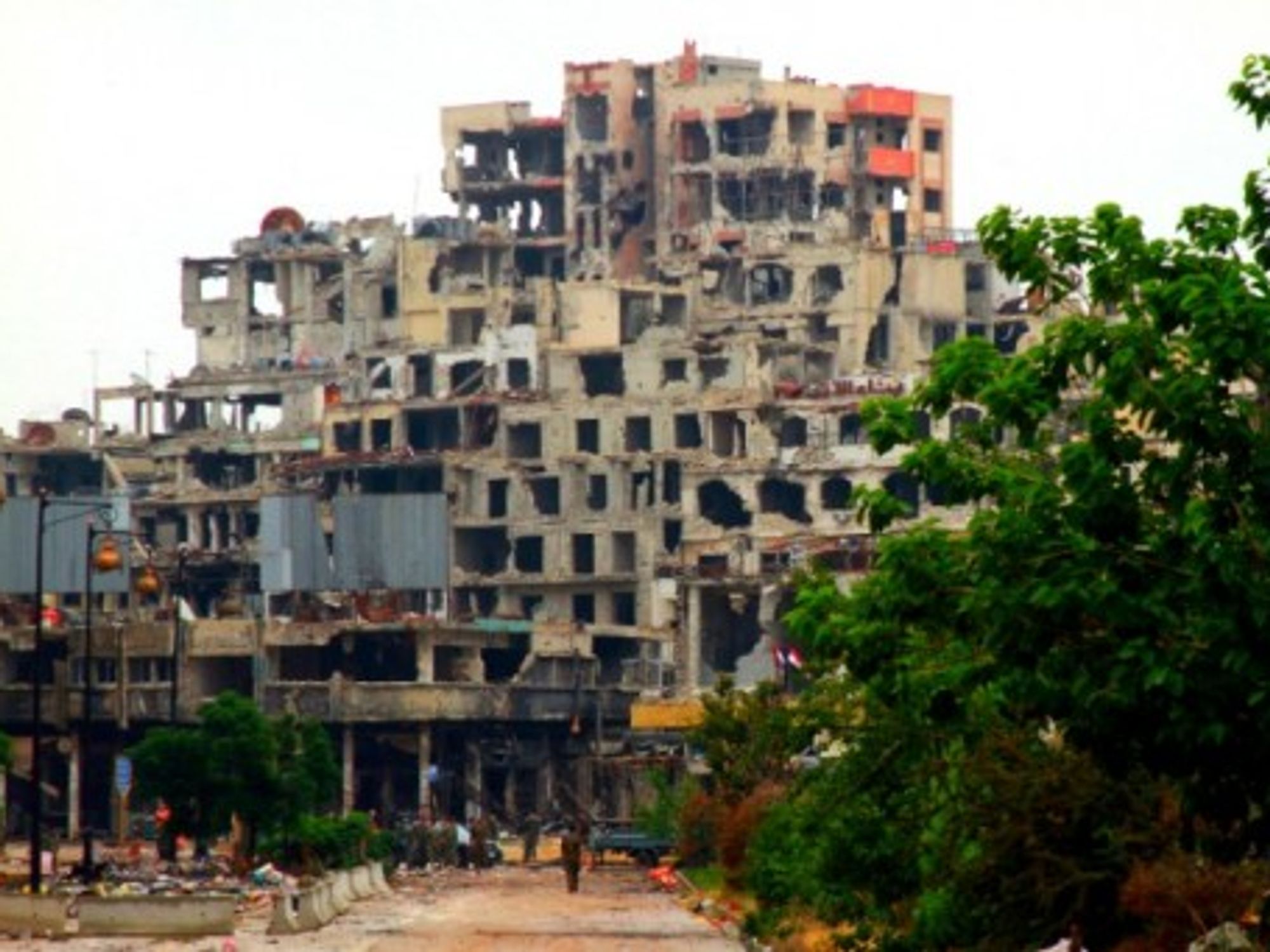Opposition forces have evacuated a ruined Homs.