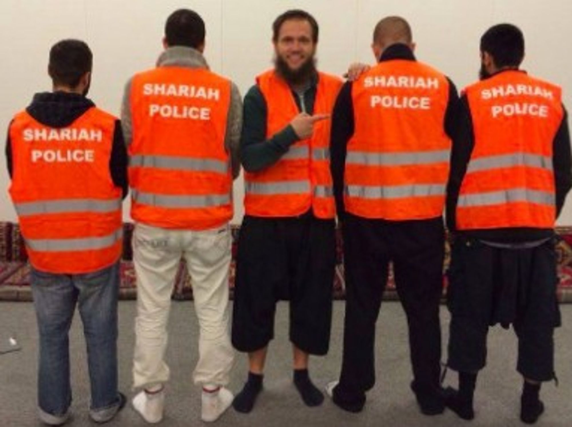 Orange-clad vigilantes