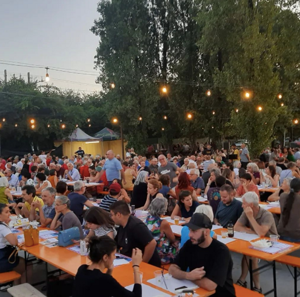 Over 400 people gathered around a pasta dinner.