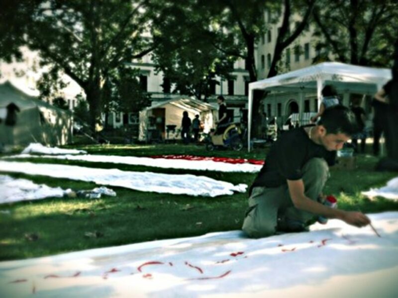 Painting banners in Berlin's Oranienplatz square
