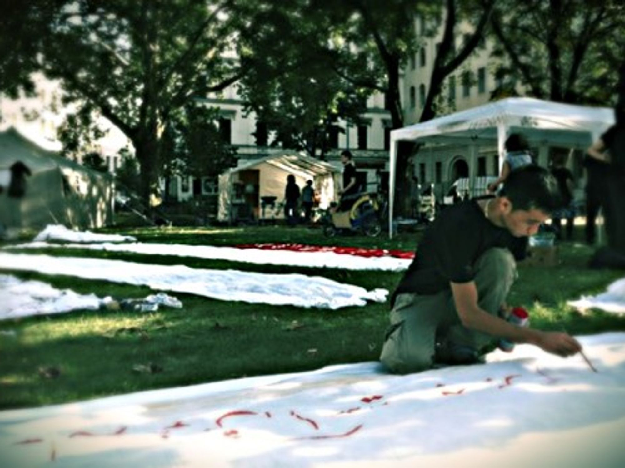 Painting banners in Berlin's Oranienplatz square