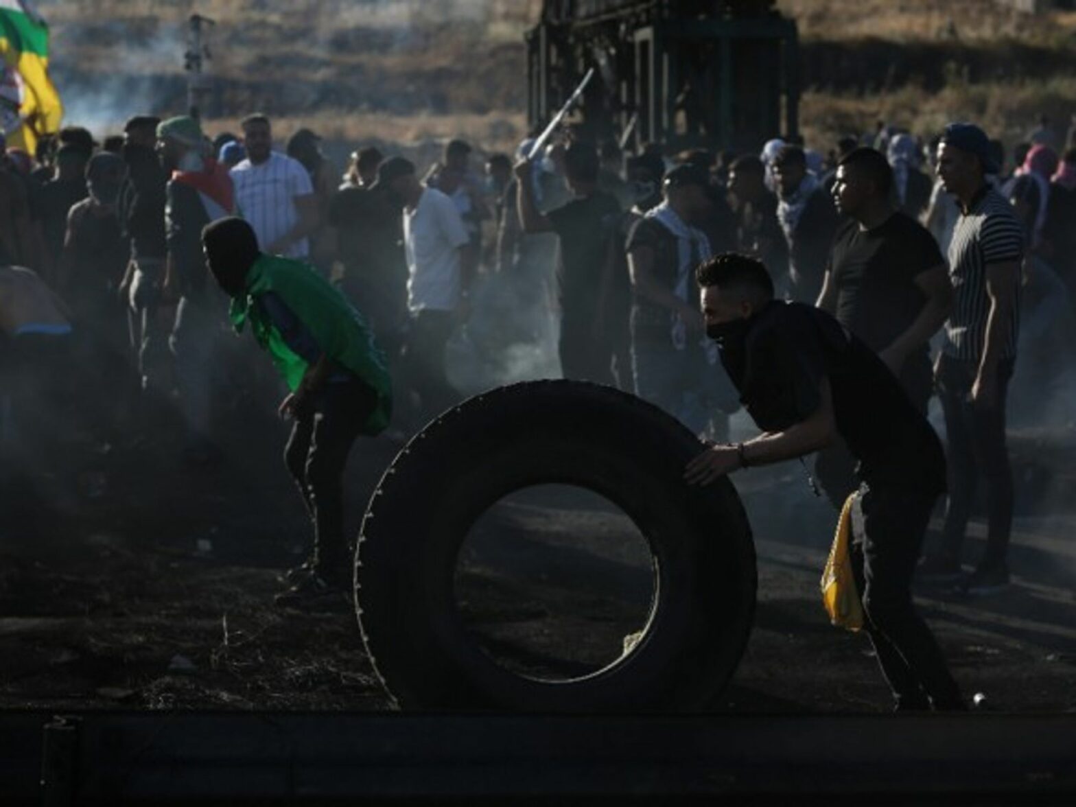 Palestinian protesters clash with Israeli soldiers near Nablus in the occupied West Bank