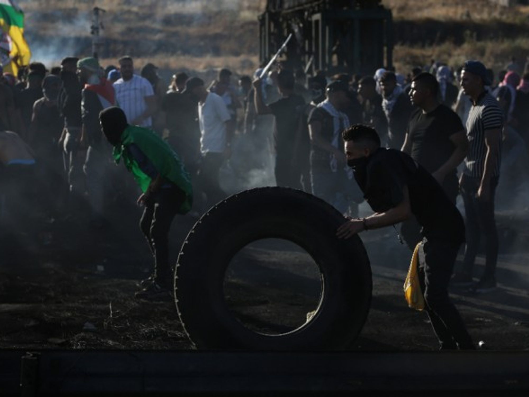 Palestinian protesters clash with Israeli soldiers near Nablus in the occupied West Bank