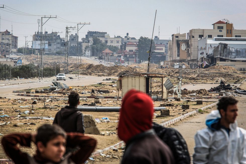 Palestinians flee the city of Khan Yunis towards Rafah, after the Israeli army partially withdrew from the vicinity of Al-Aqsa University.