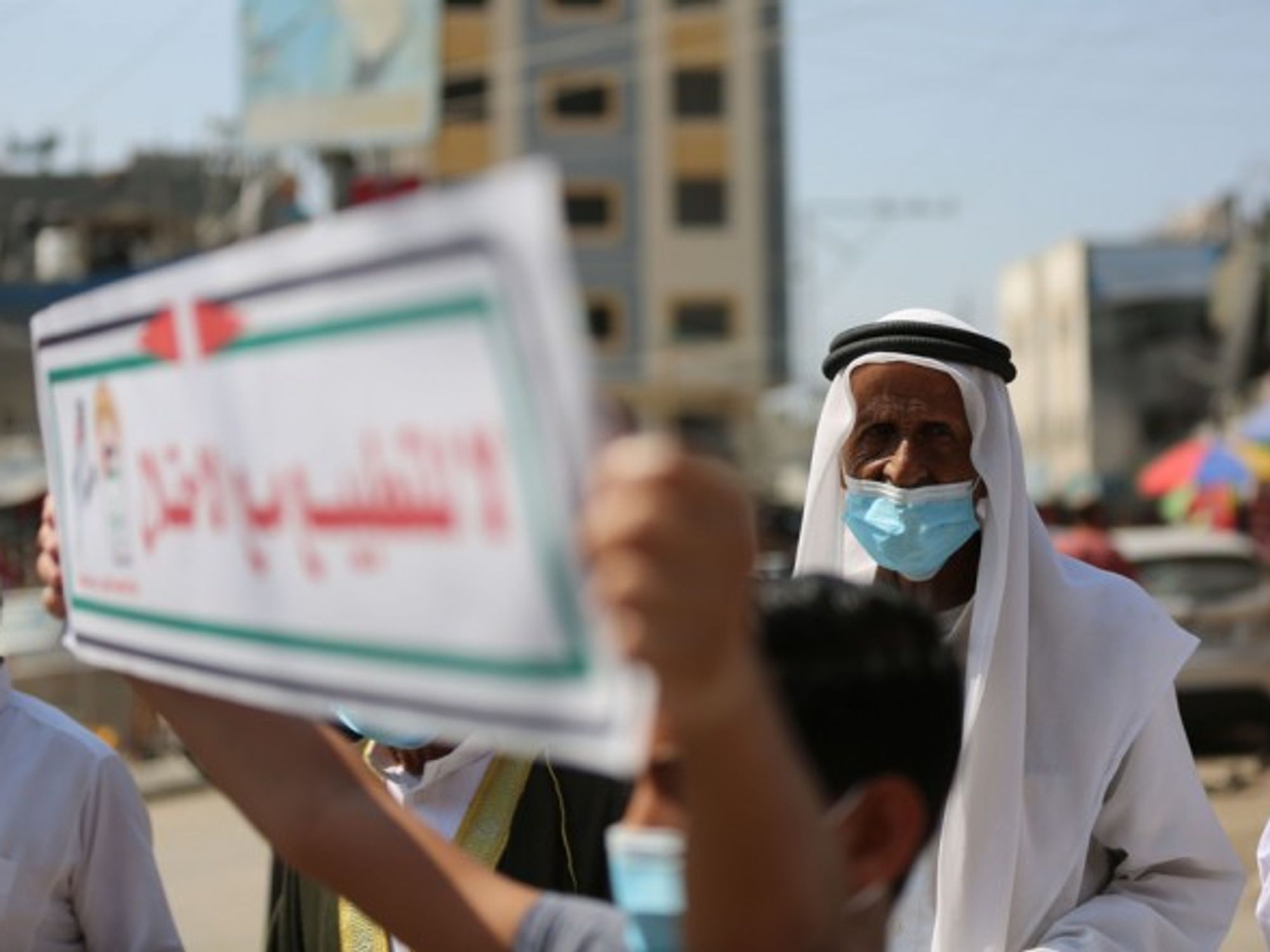 Palestinians in the Gaza Strip protesting against the accord
