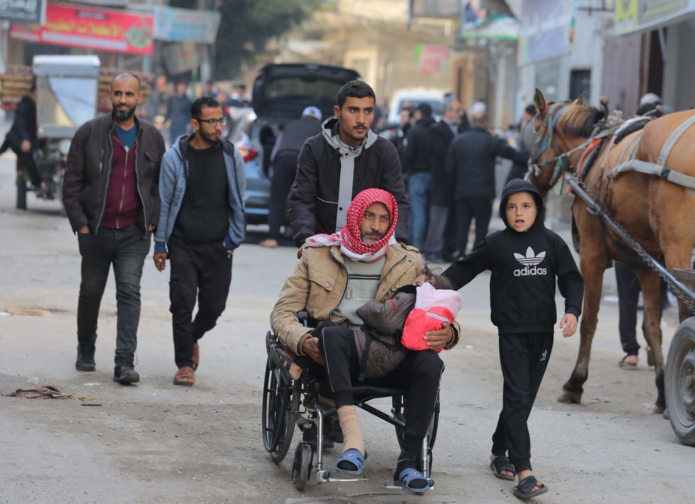 Palestinians migrating to southern regions leave Al-Breij for Dair El-Balah as they face forced displacement due to ongoing Israeli attacks in Al-Breij, Gaza.